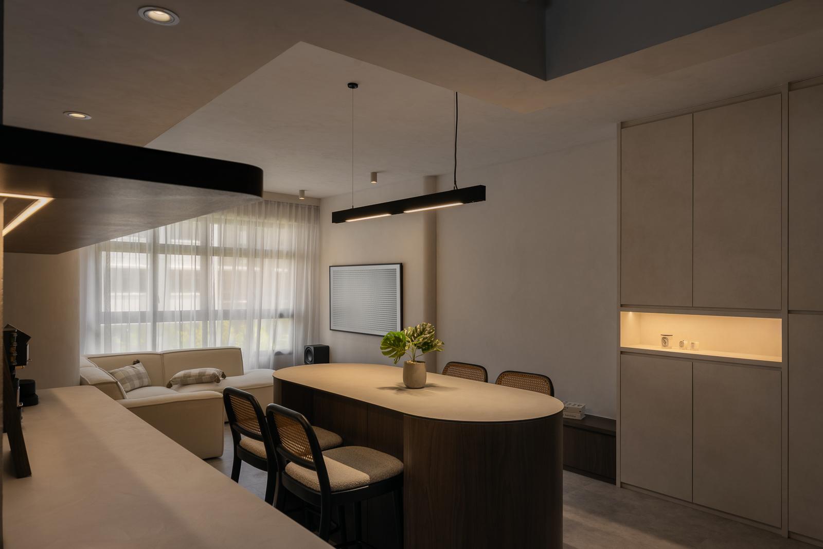 Minimalist Dining Room with Drop Light and Dining Table
