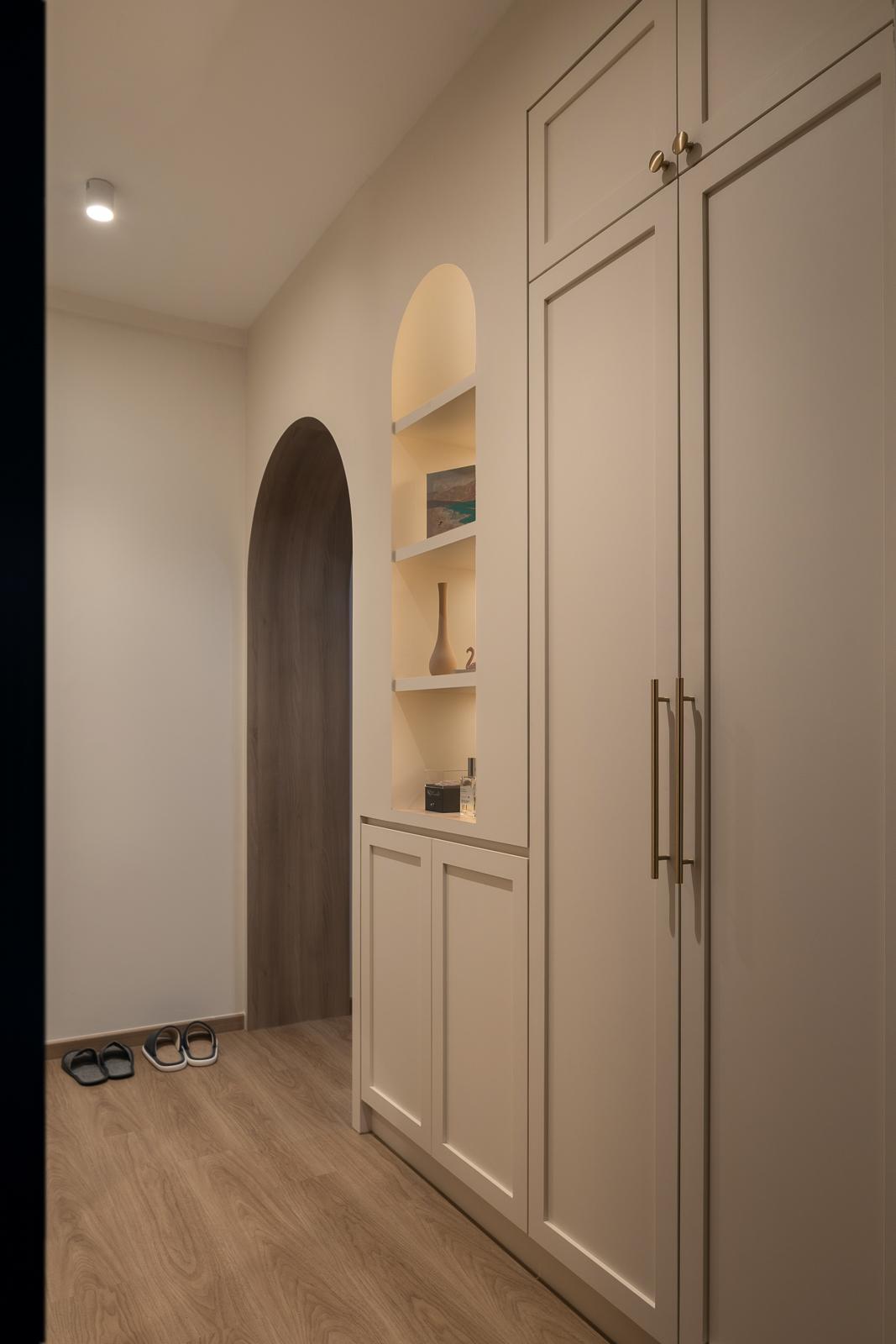 Scandinavian Entryway with Storage Cabinets and Small Storage
