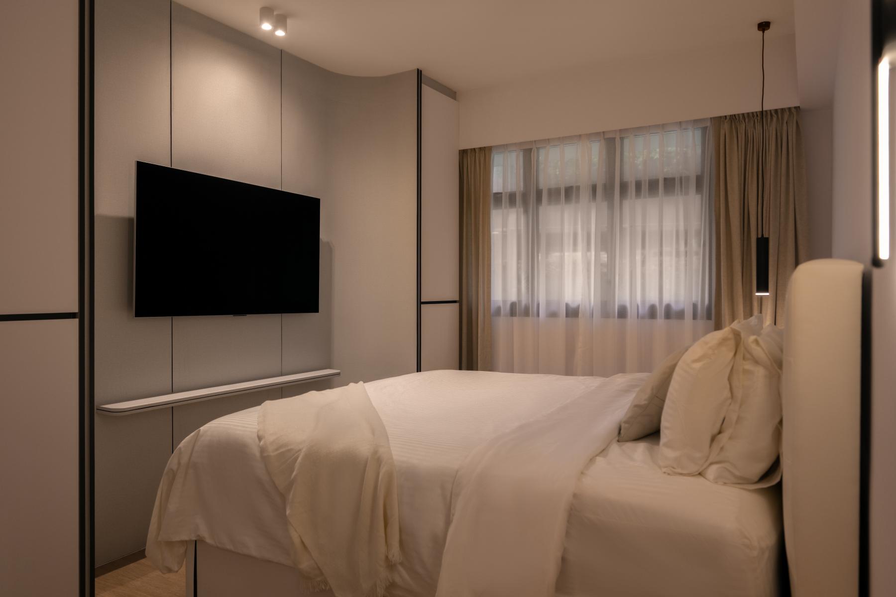 Minimalist Bedroom with Feature Wall and Downlights