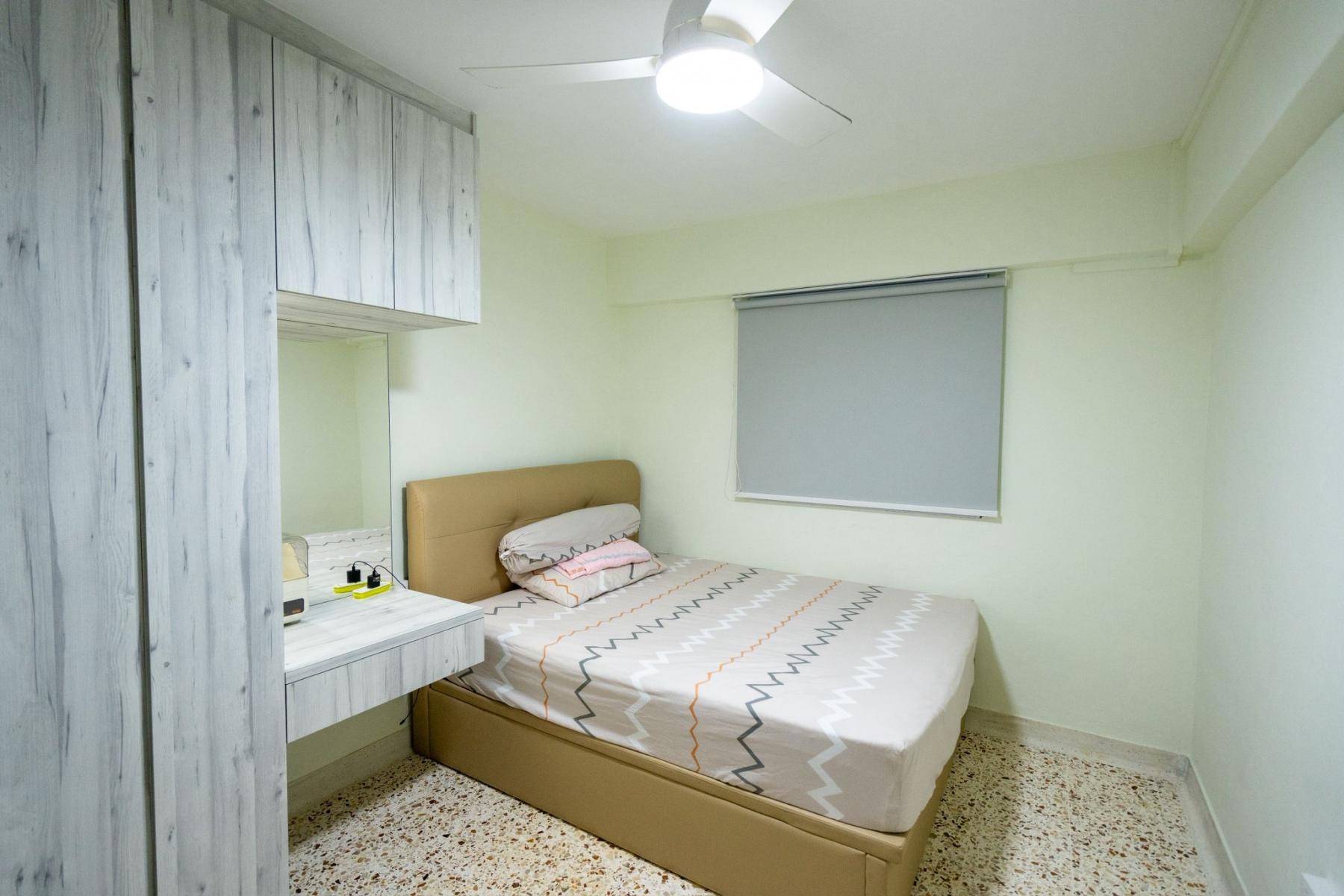 Asian Bedroom with Bookshelf and Wardrobe