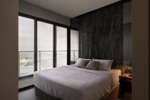 Modern Bedroom at Ave South Residences
