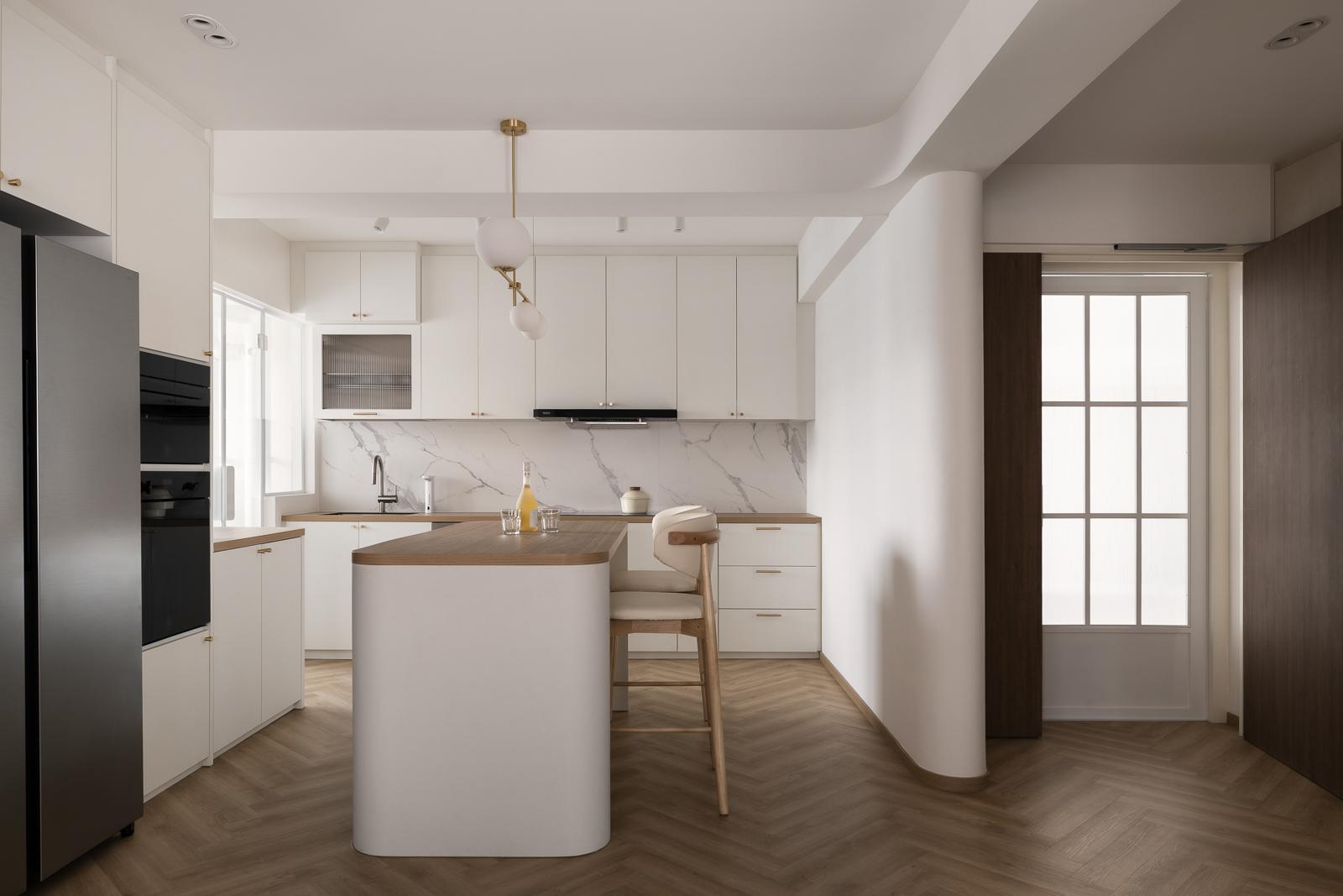 Scandinavian Kitchen with Herringbone Tiling and Wood Flooring