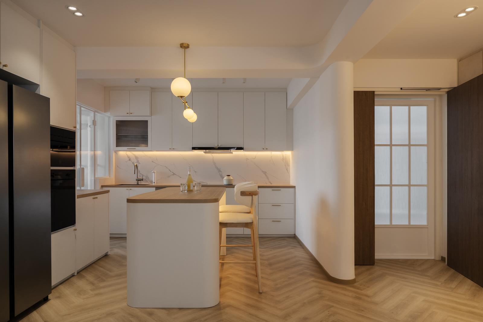 Scandinavian Kitchen with Herringbone Tiling and Wood Flooring