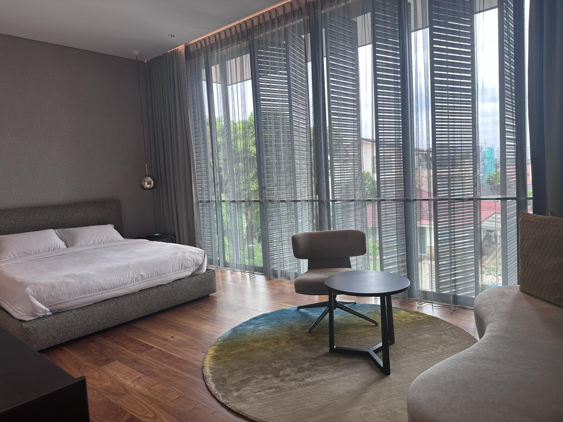 Modern Bedroom with Queen Bed and Bed