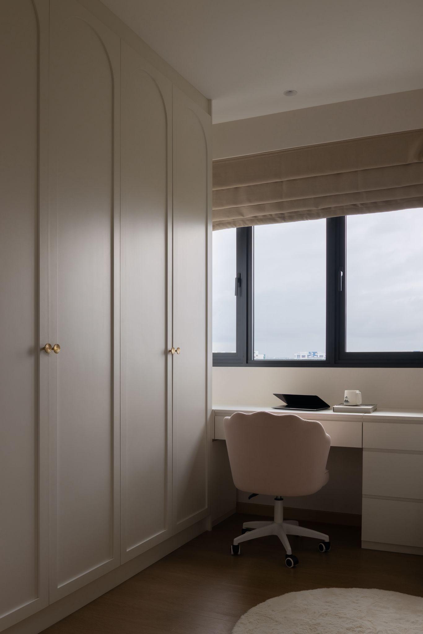 Minimalist Home Office with Storage Cabinets and Computer