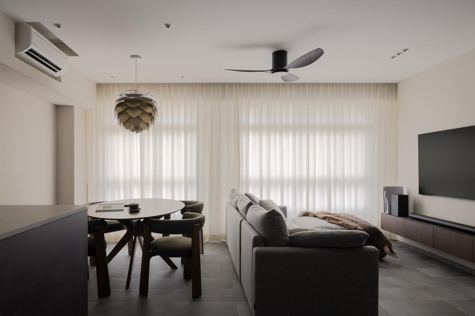 Minimalist Living Room with Homogeneous Tiles and TV Console