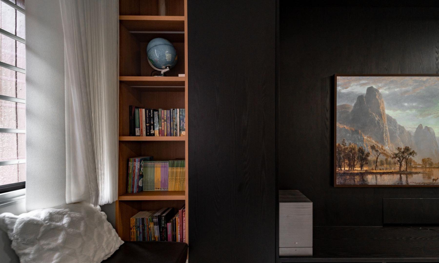 Modern Living Room with Bookshelf and Settee