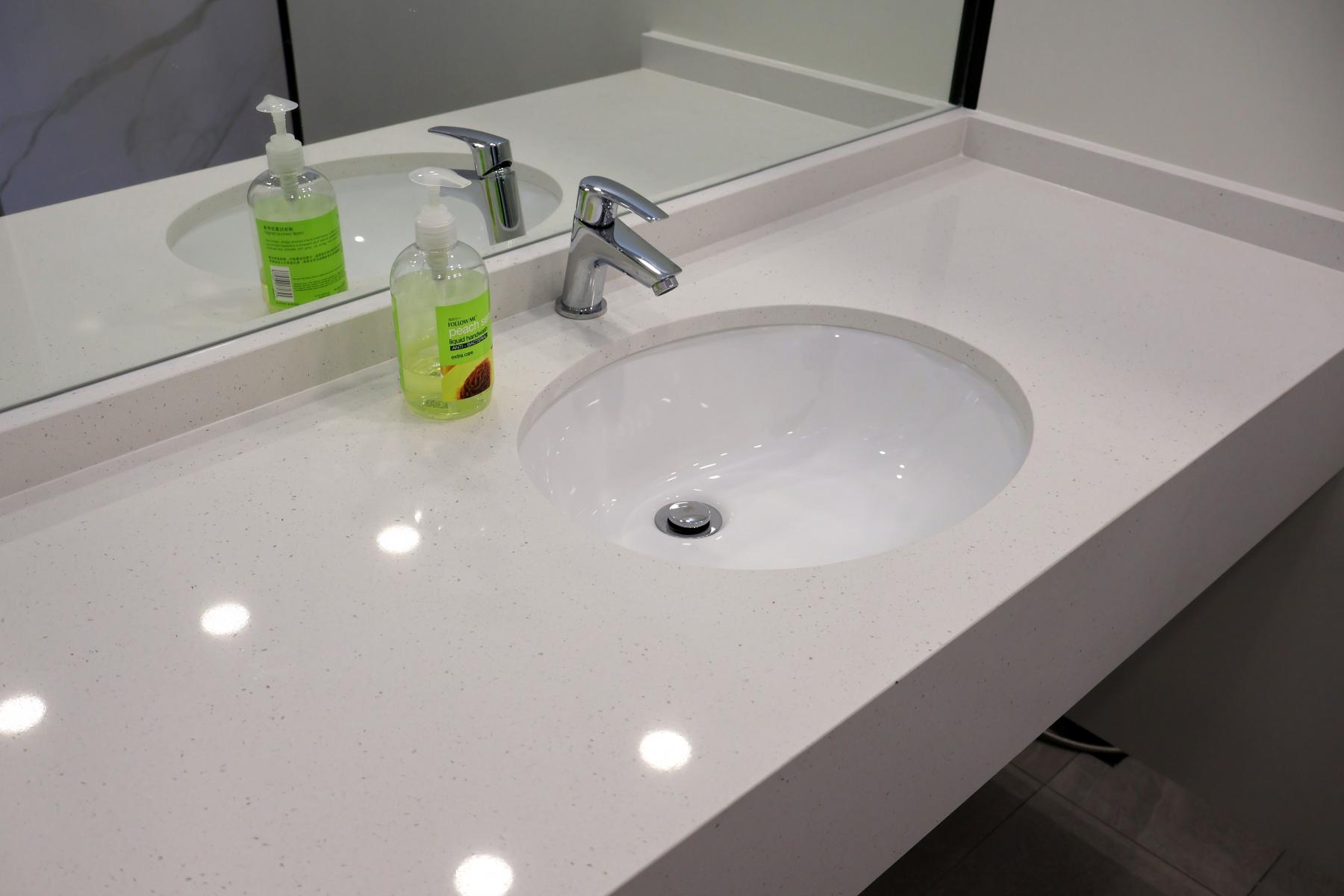 Minimalist Bathroom with Wash Basins and Bathroom Tap