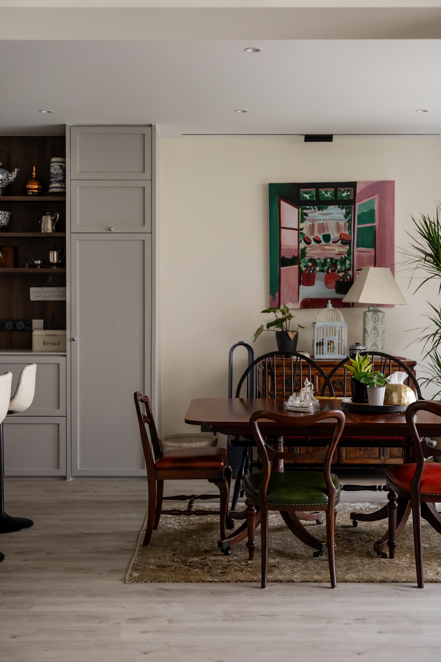 Vintage Dining Room with Drop Light and Artwork