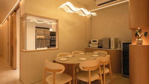 Minimalist Dining Room at The Venue Residence