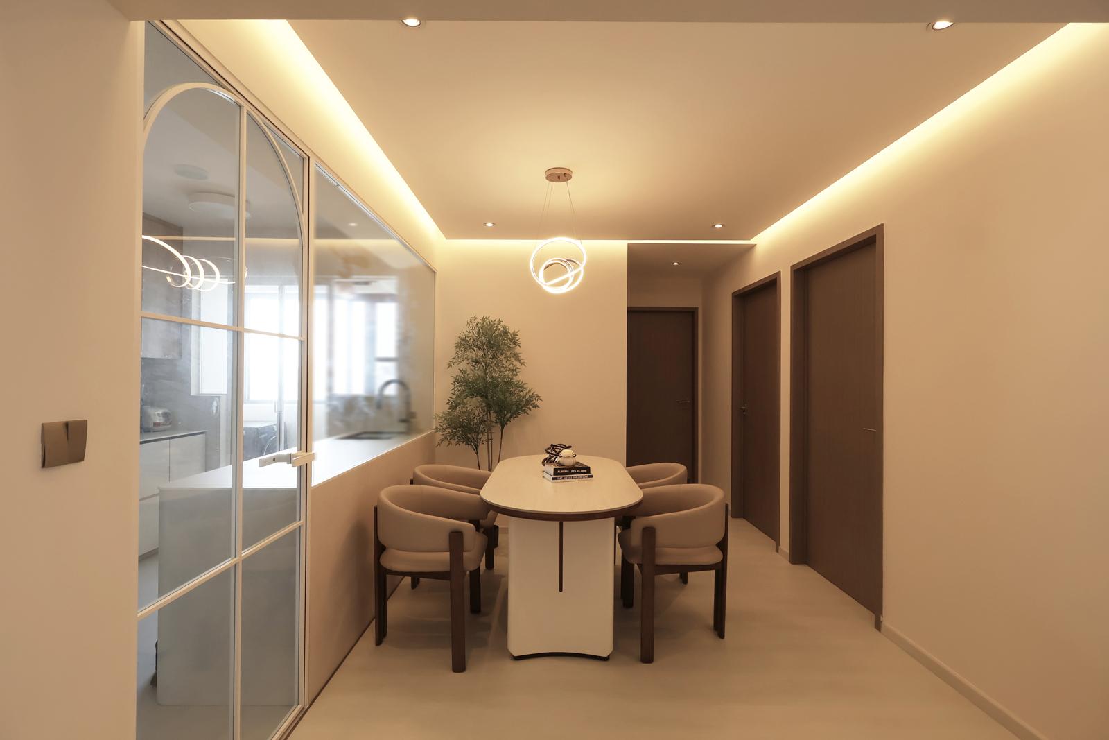 Contemporary Dining Room with Cove Lighting and Chandelier