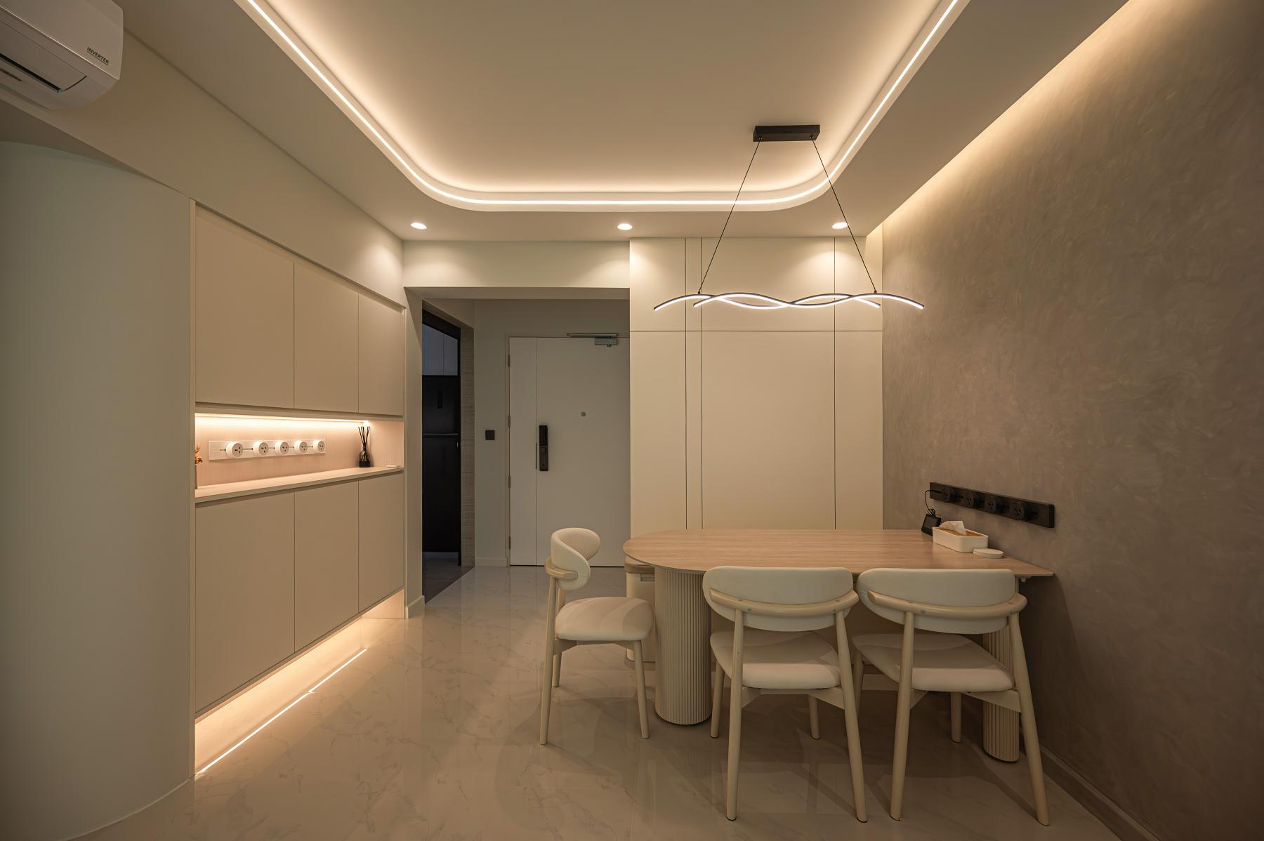 Minimalist Dining Room with Cove Lighting and Dining Table