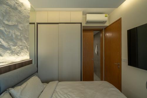 Modern Bedroom at Penrose Condo, 22 Sims Drive