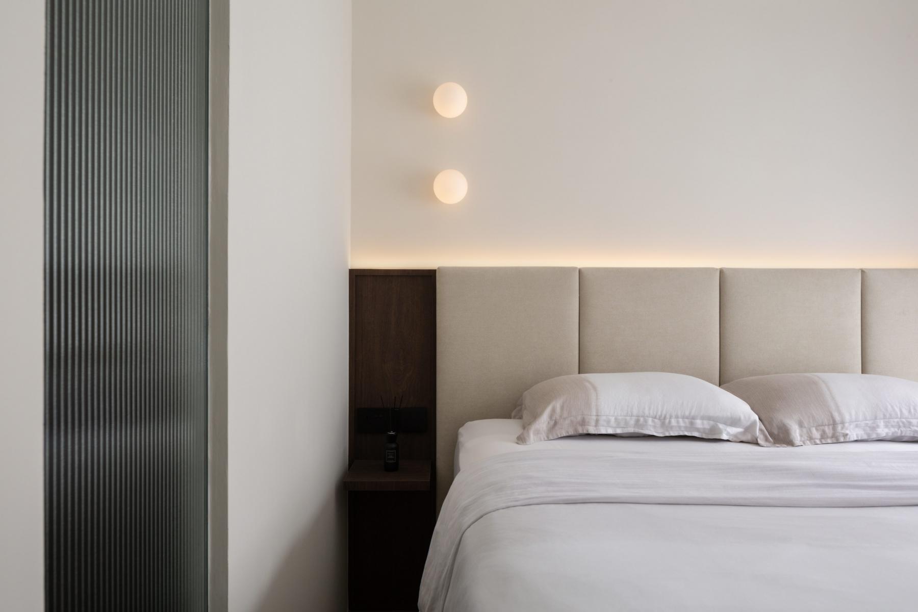 Modern Bedroom with Feature Wall and Cove Lighting
