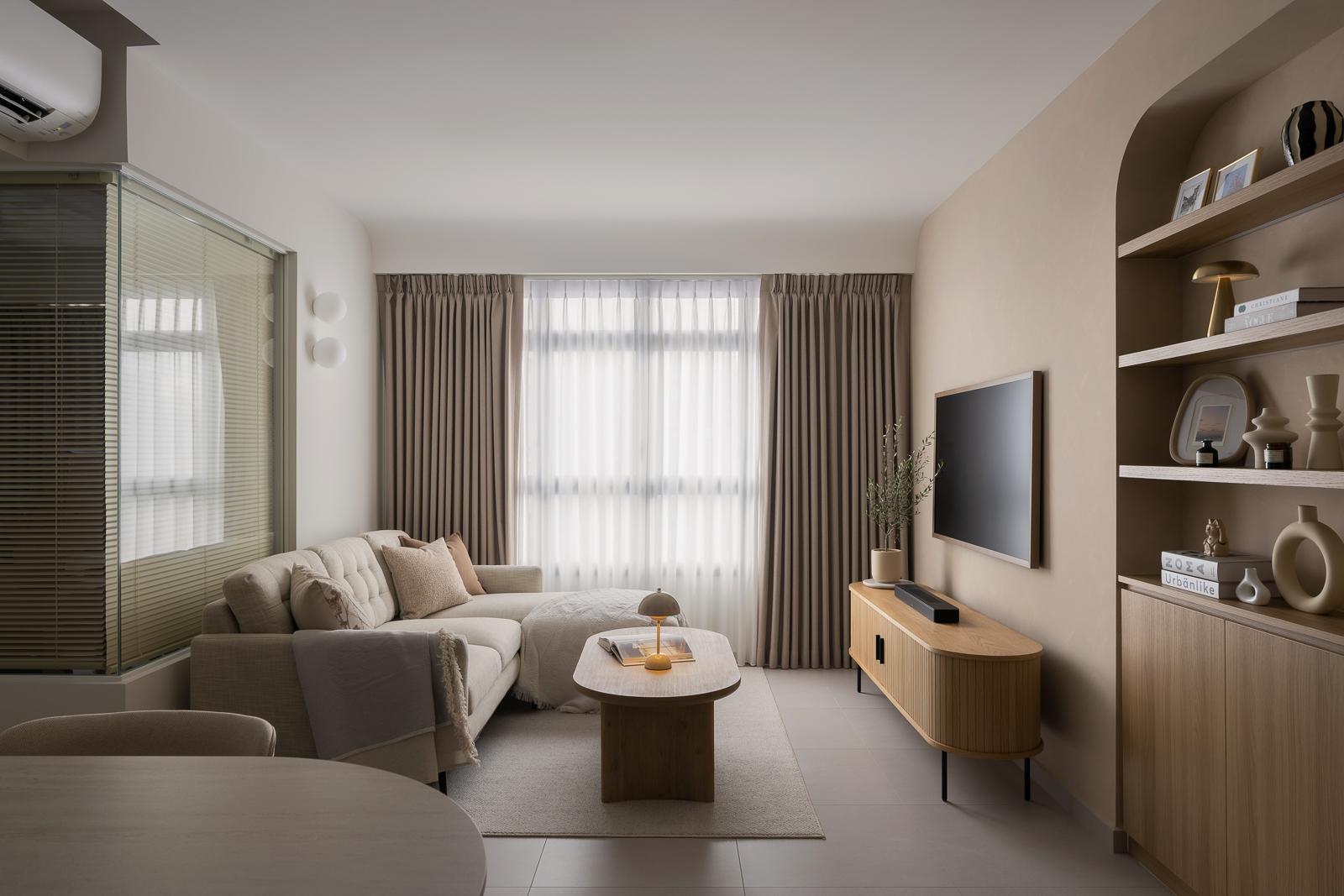 Modern Living Room with Bookshelf and Homogeneous Tiles