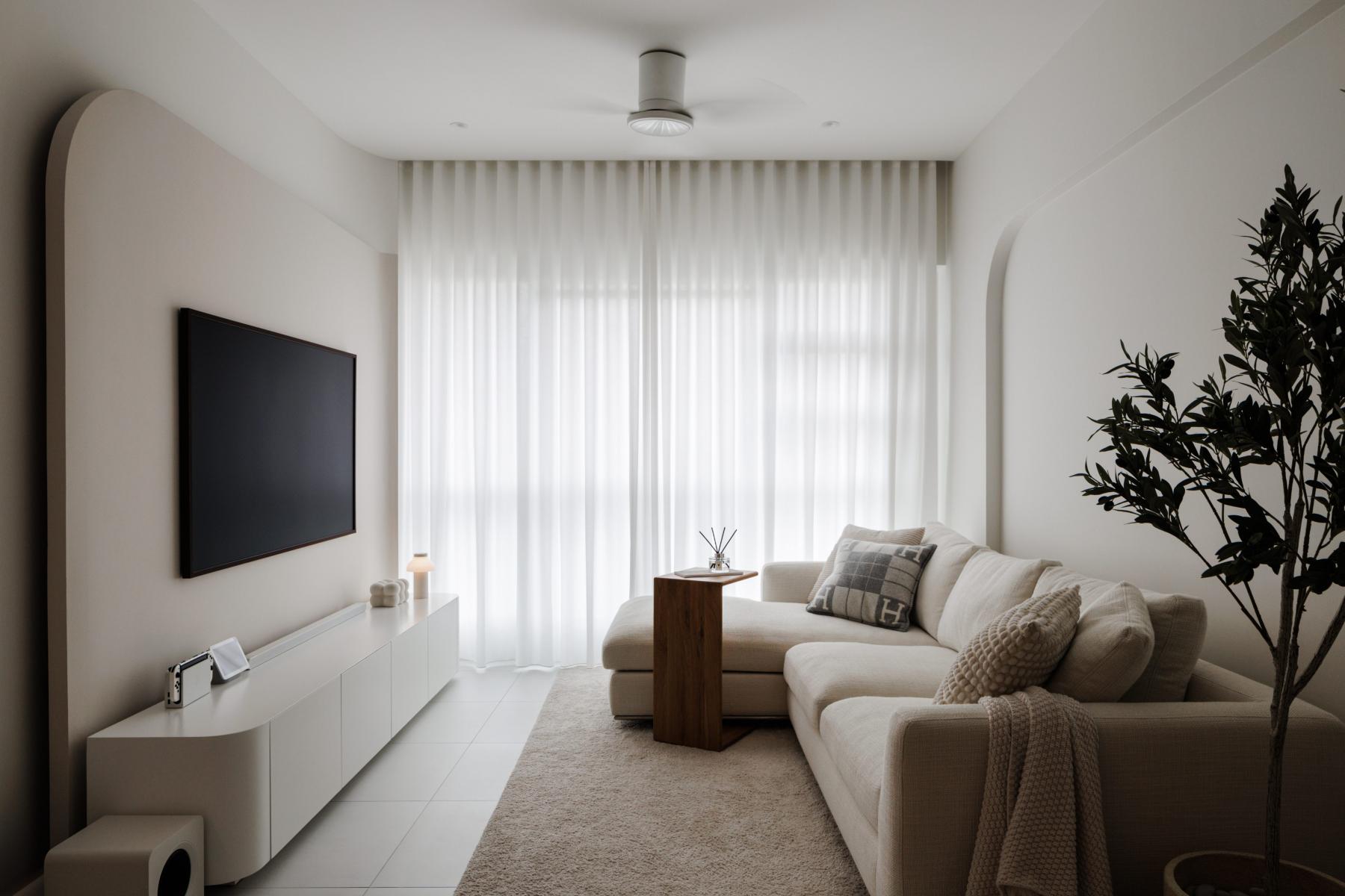 Minimalist Living Room with Homogeneous Tiles and Feature Wall