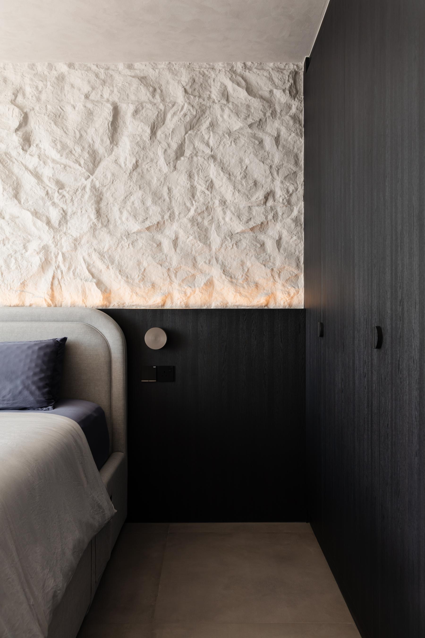 Contemporary Bedroom with Homogeneous Tiles and Feature Wall