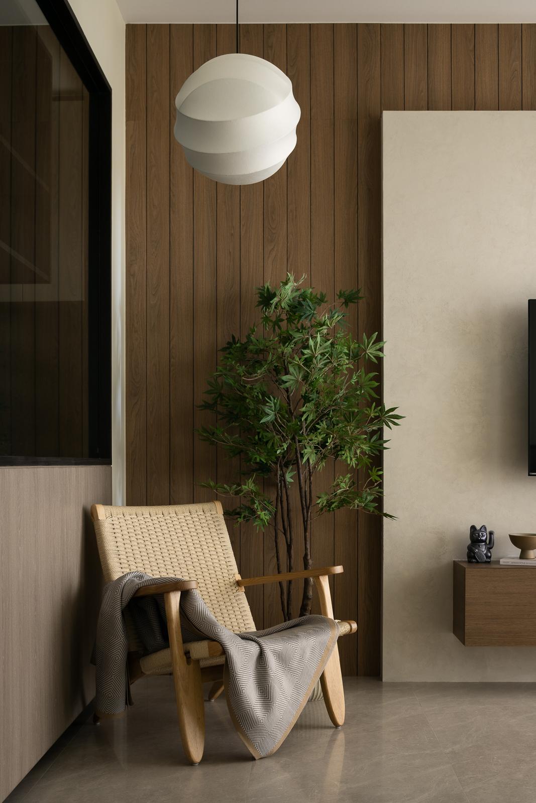 Asian Living Room with Feature Wall and Armchairs