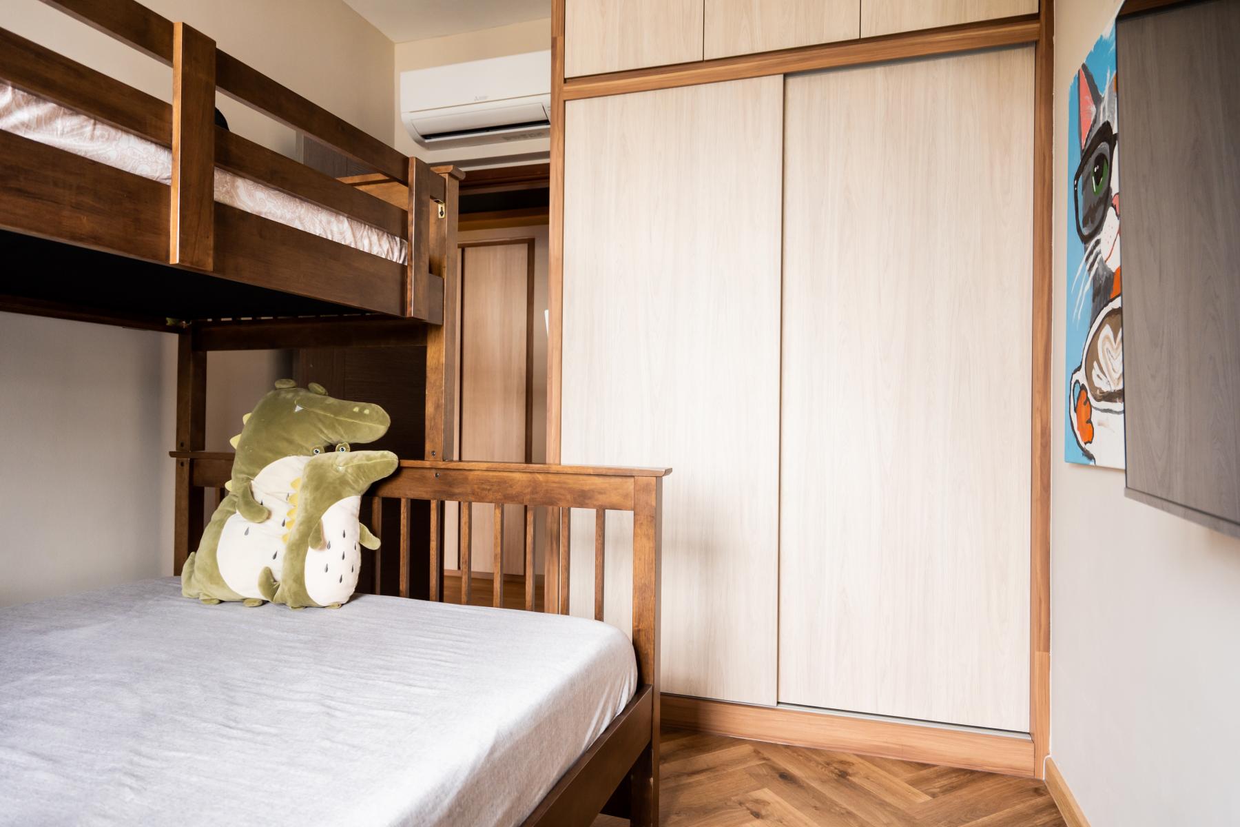 Asian Kids Room with Bookshelf and Wardrobe