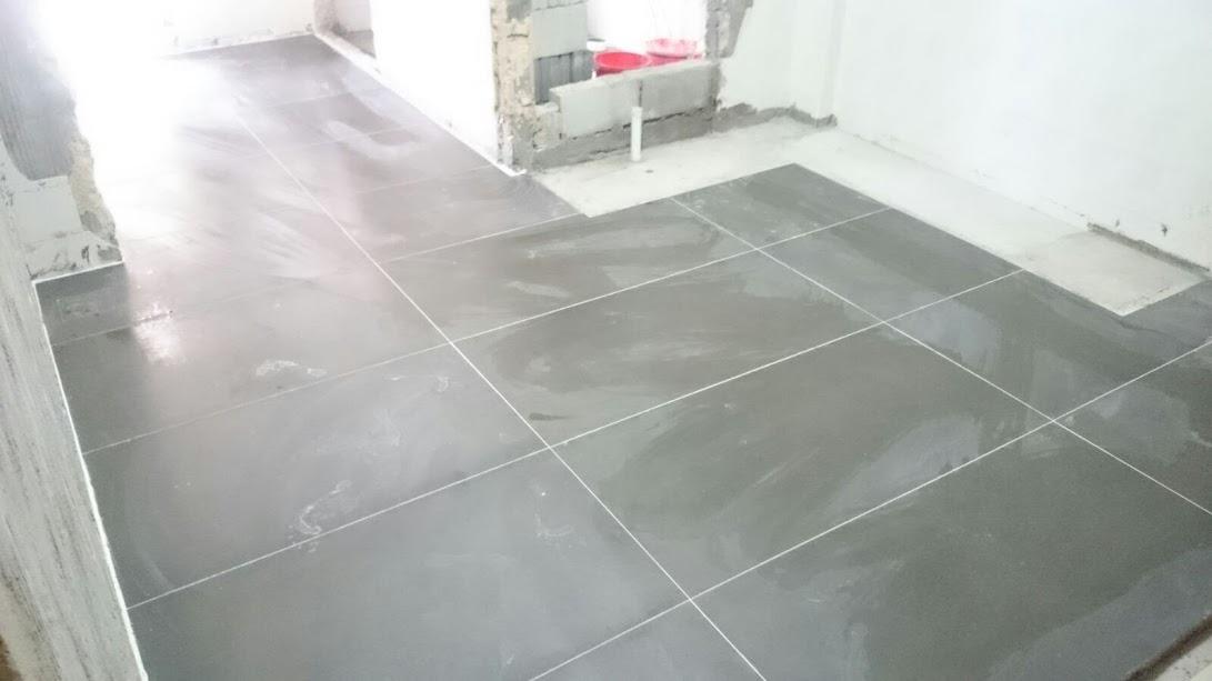 Asian Kitchen with Homogeneous Tiles and Herringbone Tiling