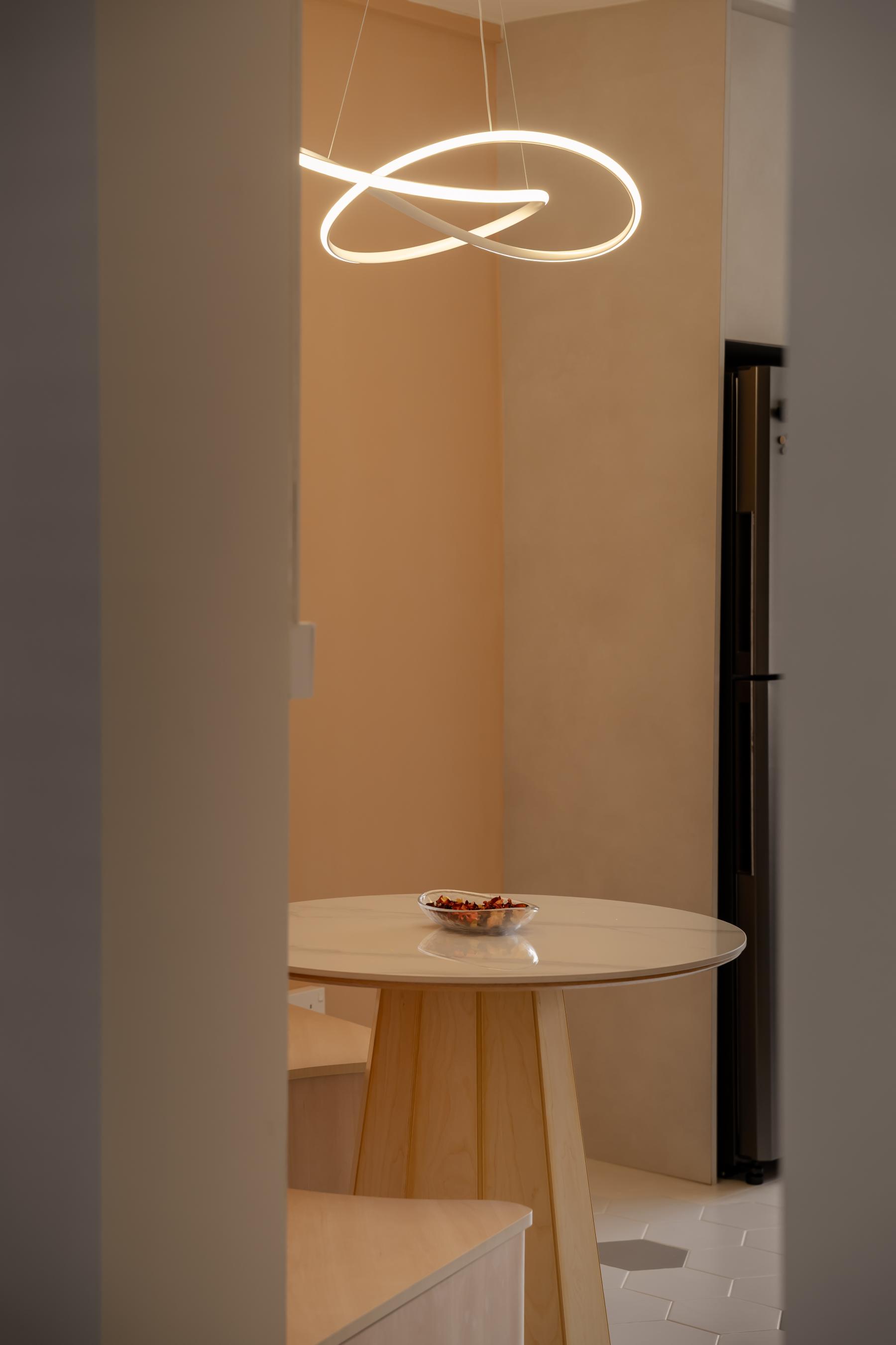 Modern Dining Room with Drop Light and Dining Table