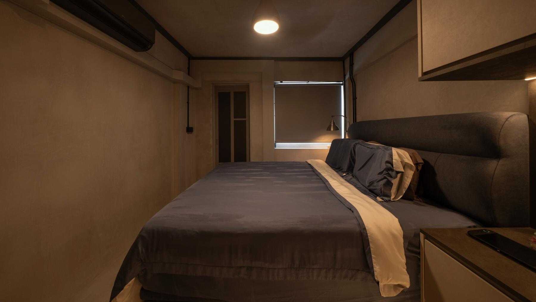 Industrial Bedroom with Cove Lighting and Ceiling Light