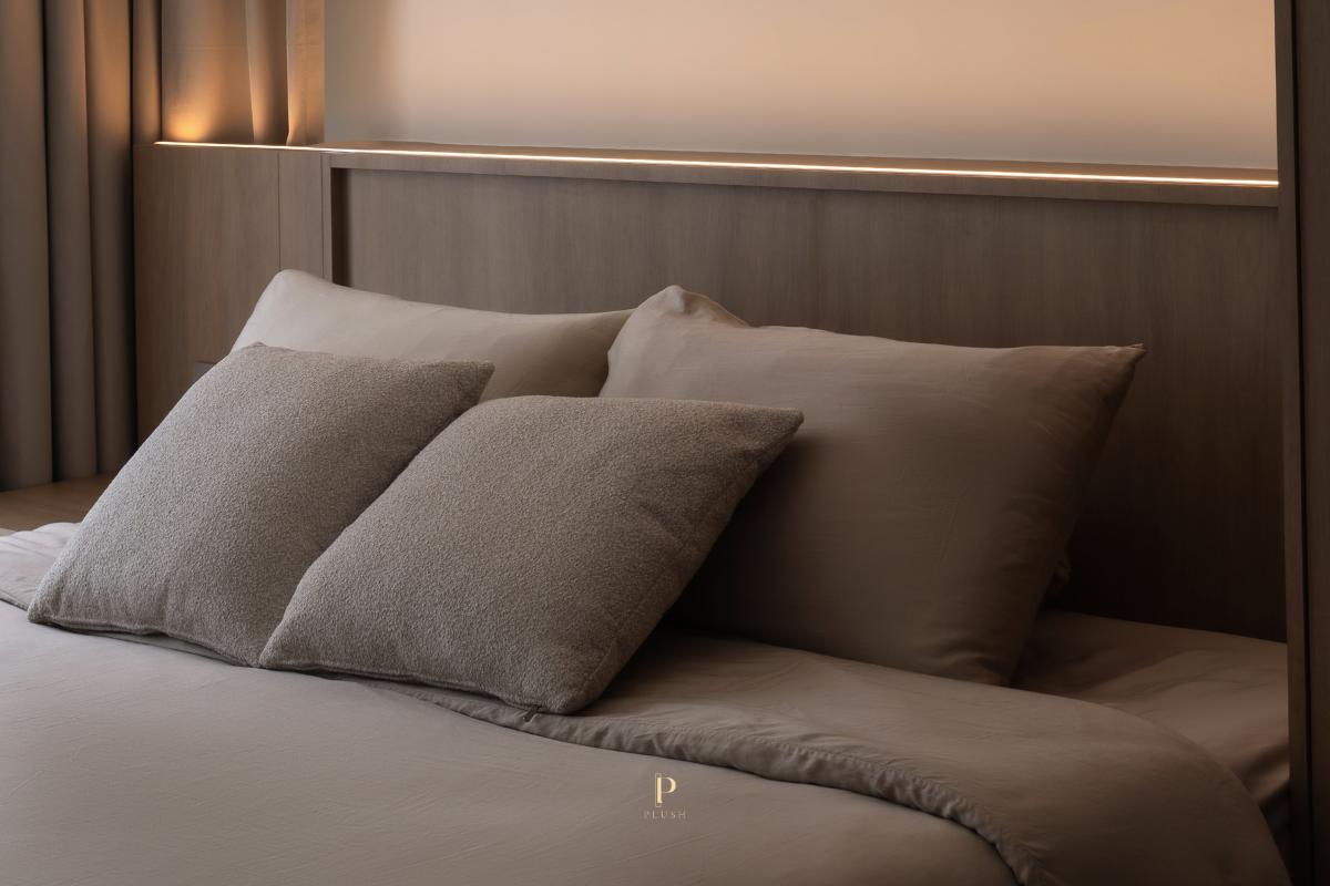 Minimalist Bedroom with Cove Lighting and Built-in Bed