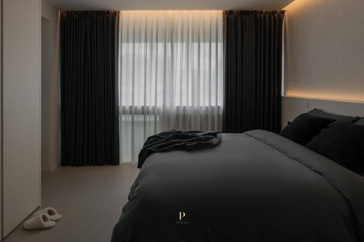 Minimalist Bedroom with Cove Lighting and Bedside Table