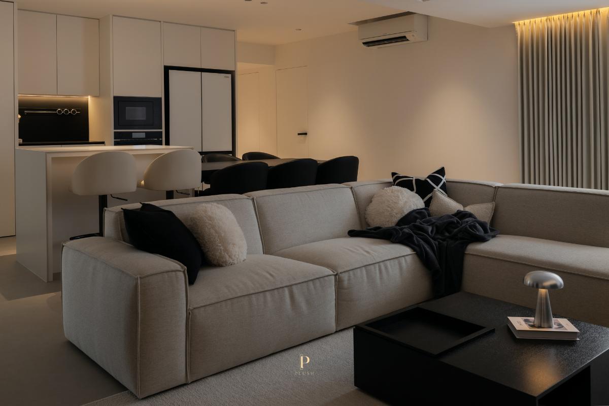 Minimalist Living Room with Countertop and Cove Lighting