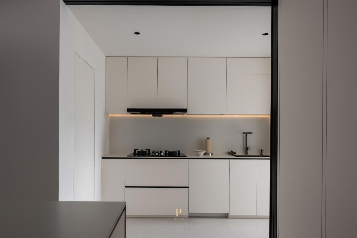 Minimalist Kitchen with Countertop and Cupboard