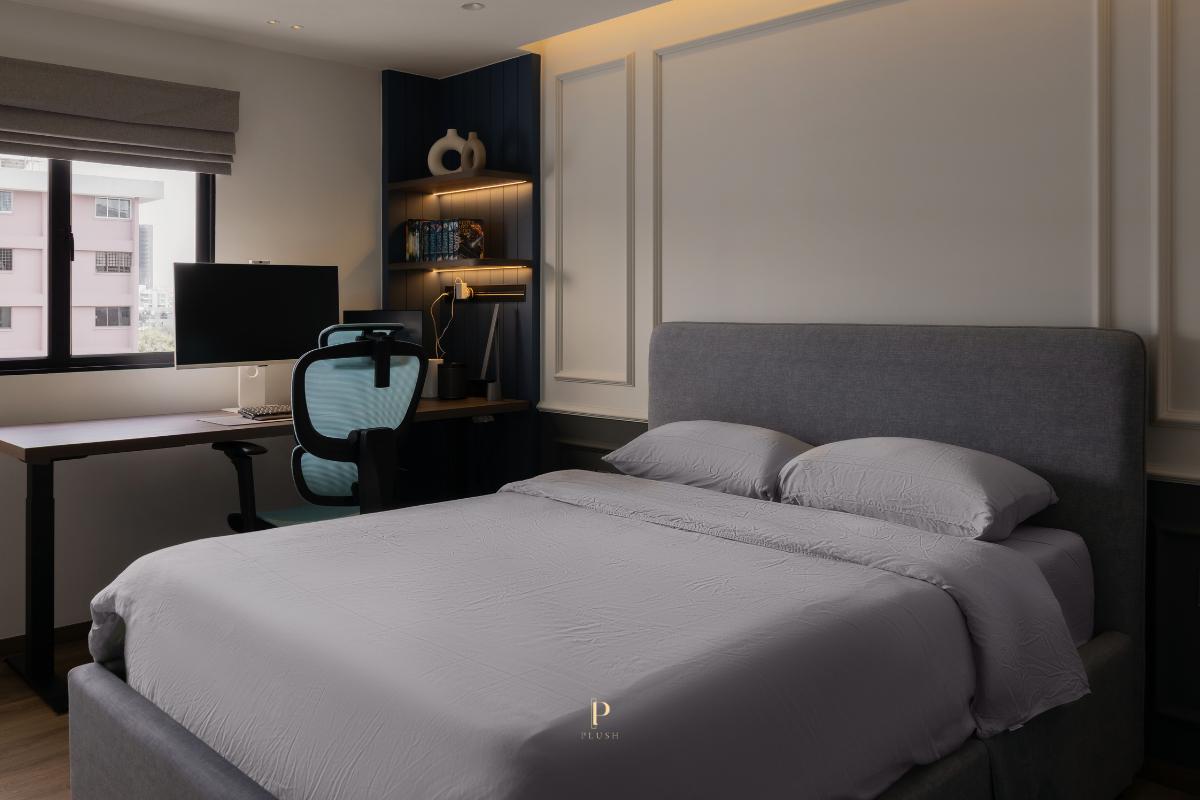 Modern Bedroom with Bookshelf and Cove Lighting