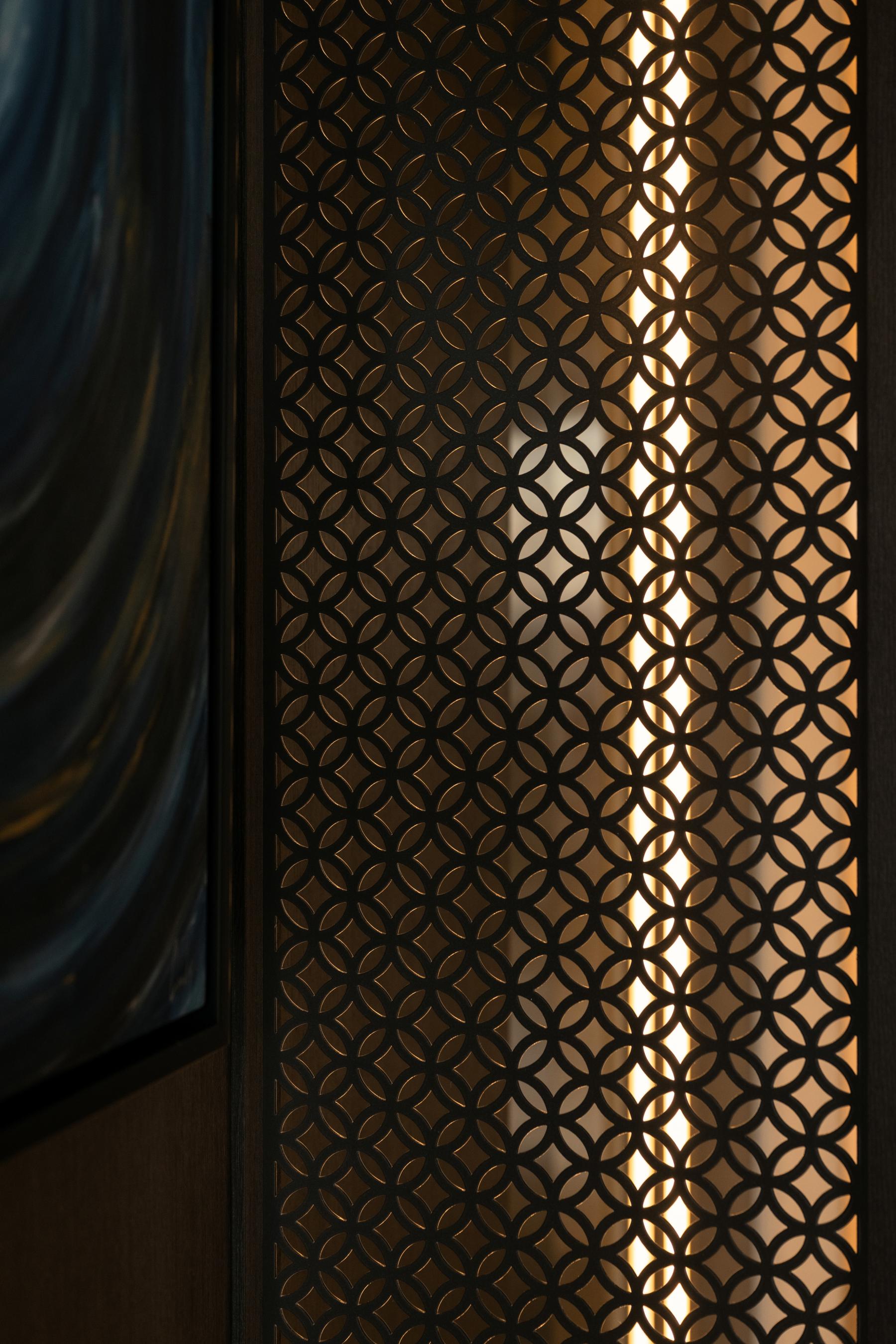 Modern Entryway with Paintings and Lighting