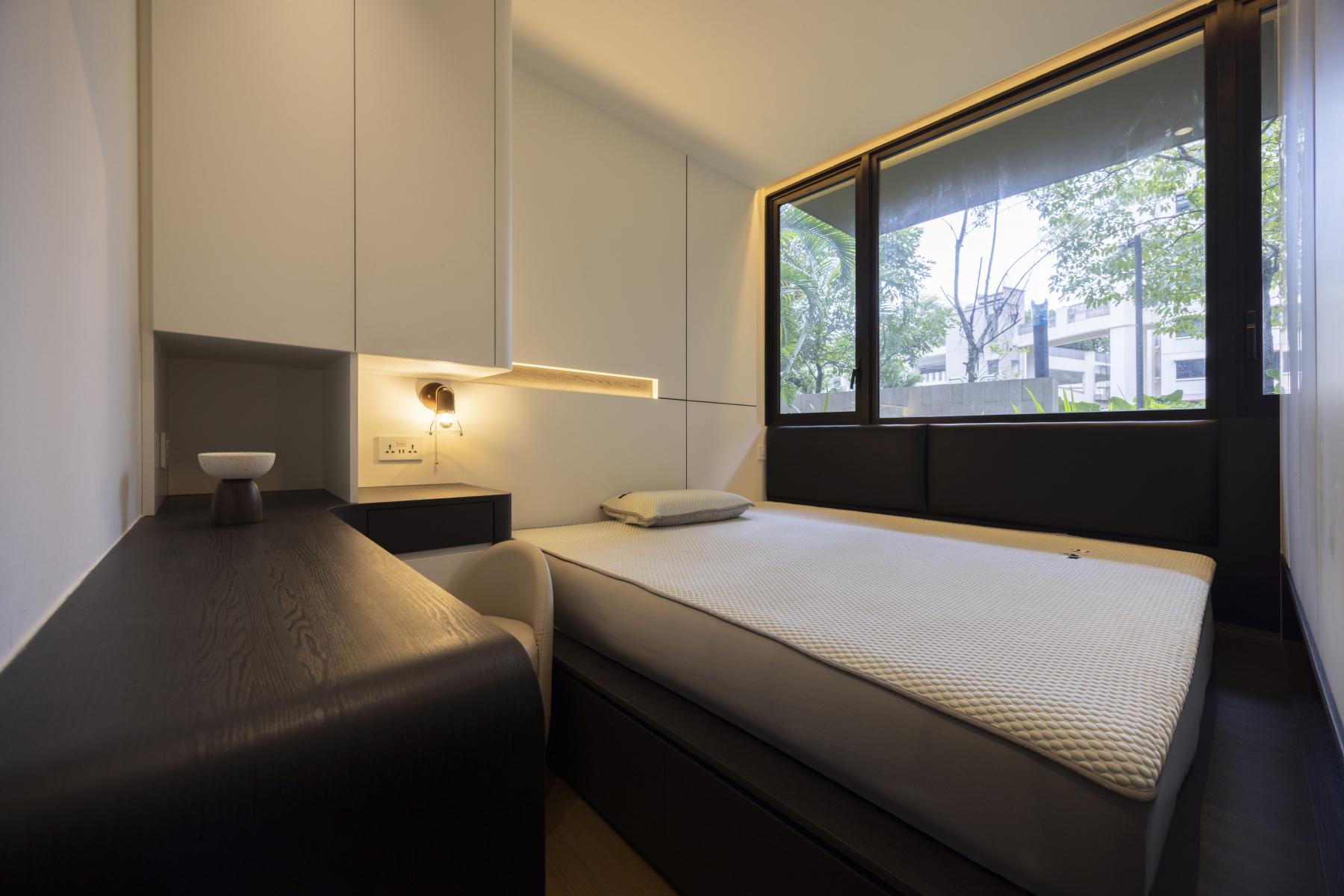 Contemporary Bedroom with Homogeneous Tiles and Wardrobe