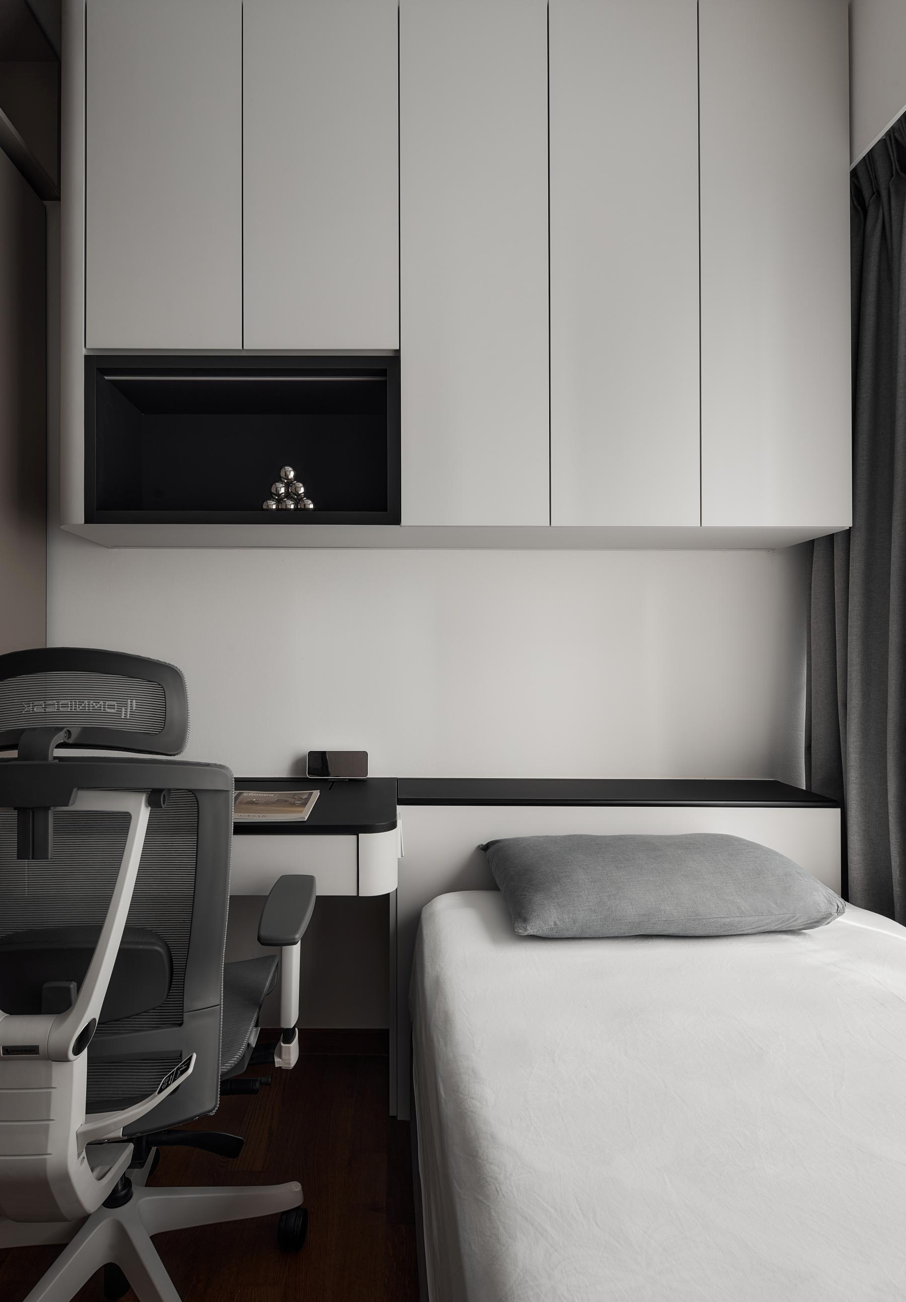 Modern Bedroom with Bedside Table and Desk Chairs