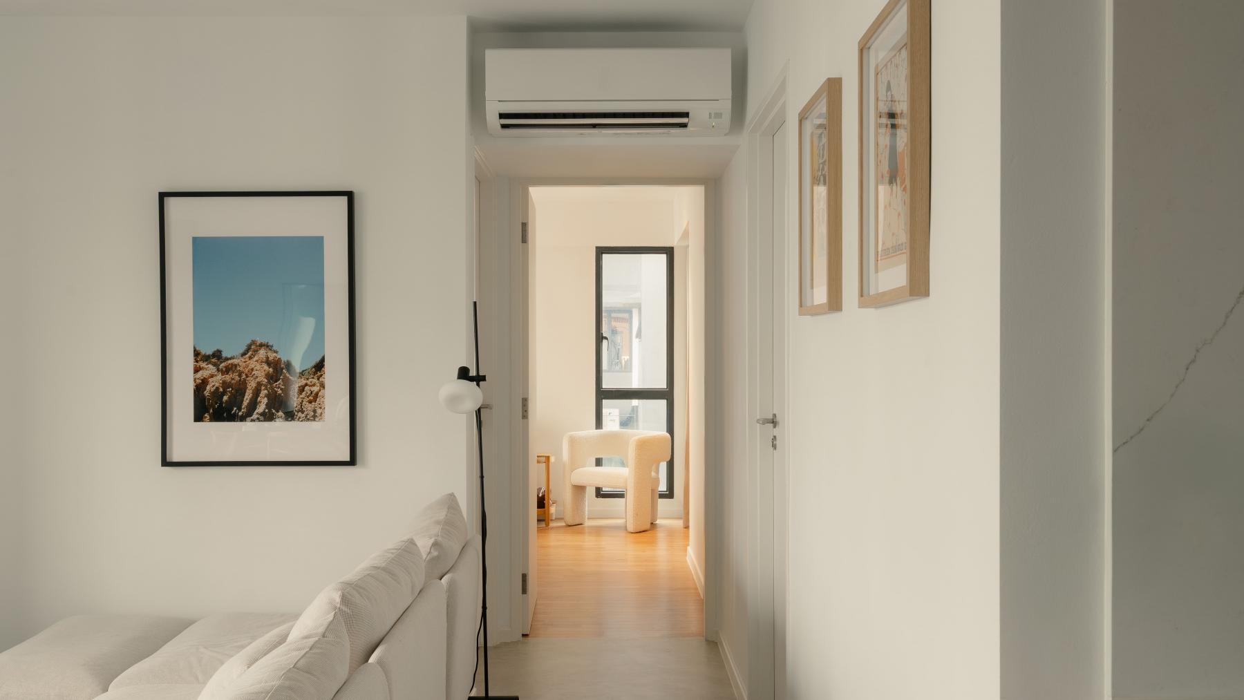 Modern Hallway with Artwork and Paintings