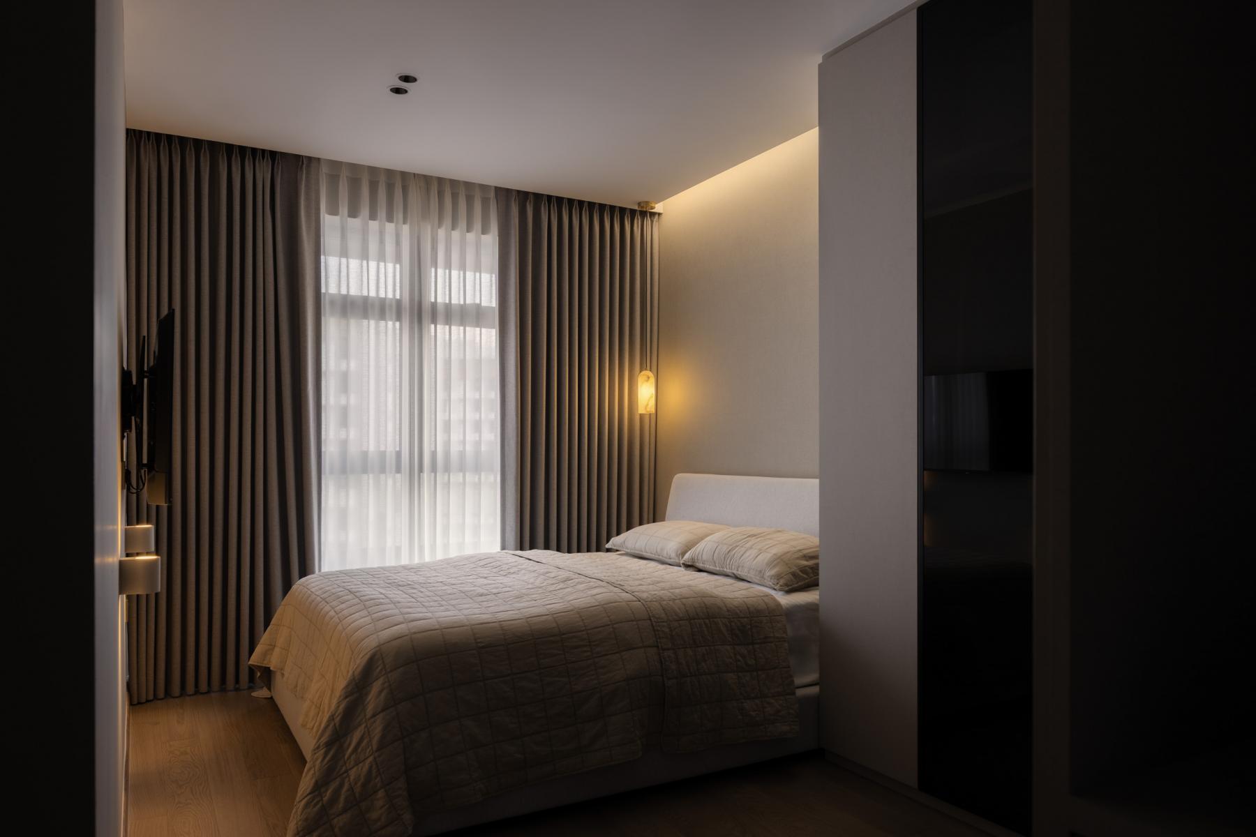 Contemporary Bedroom with Wood Flooring and Drop Light