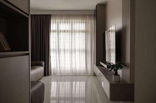 Minimalist Living Room at 233A Upper Aljunied Road