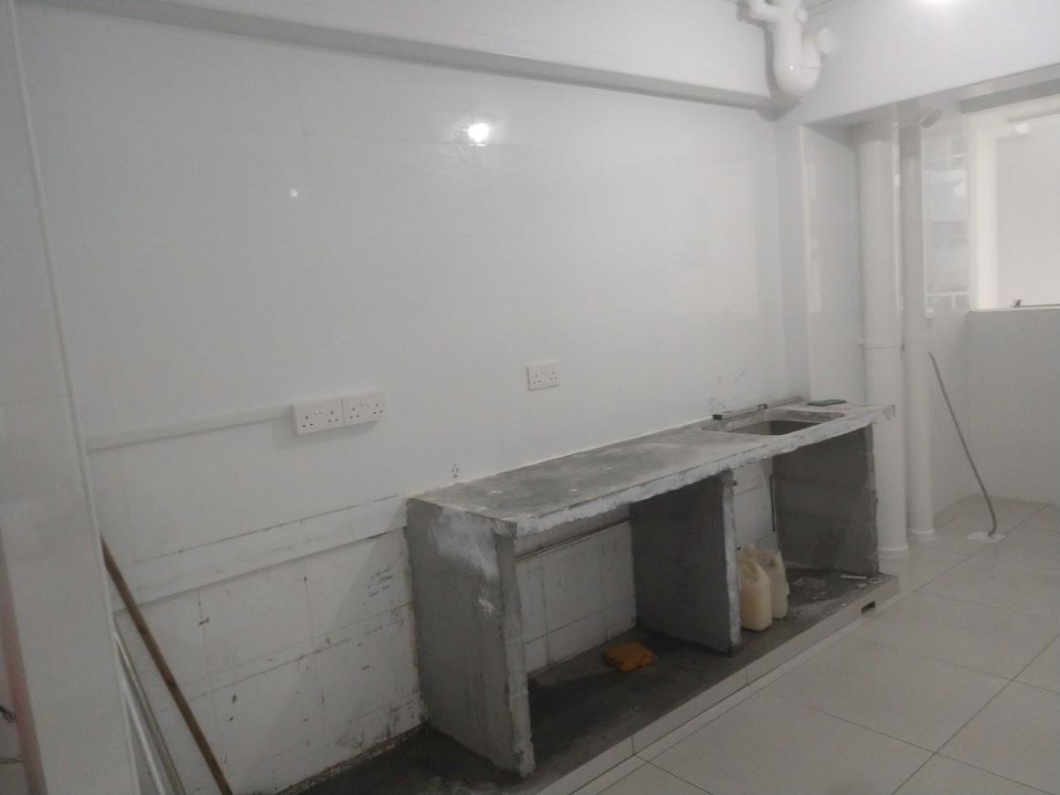 Asian Kitchen with Kitchen Island and Cupboard