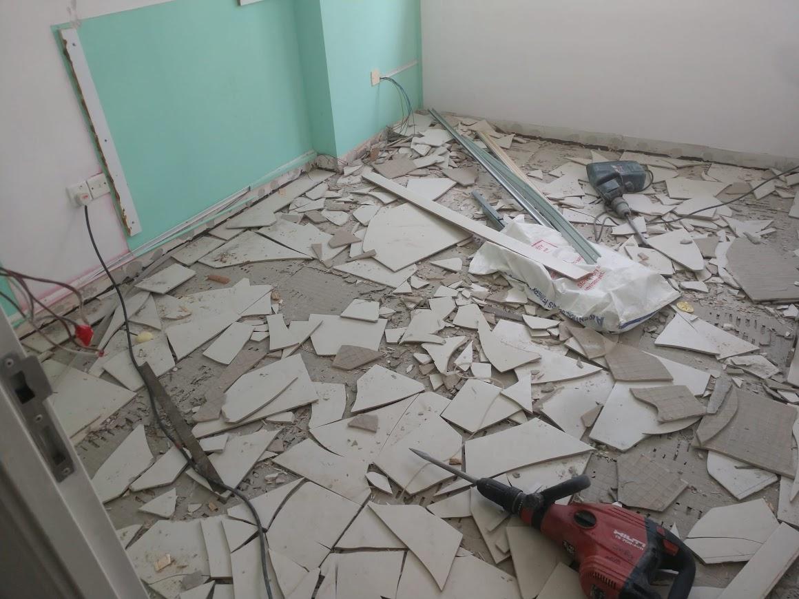 Asian Bedroom with Homogeneous Tiles and Bedside Table