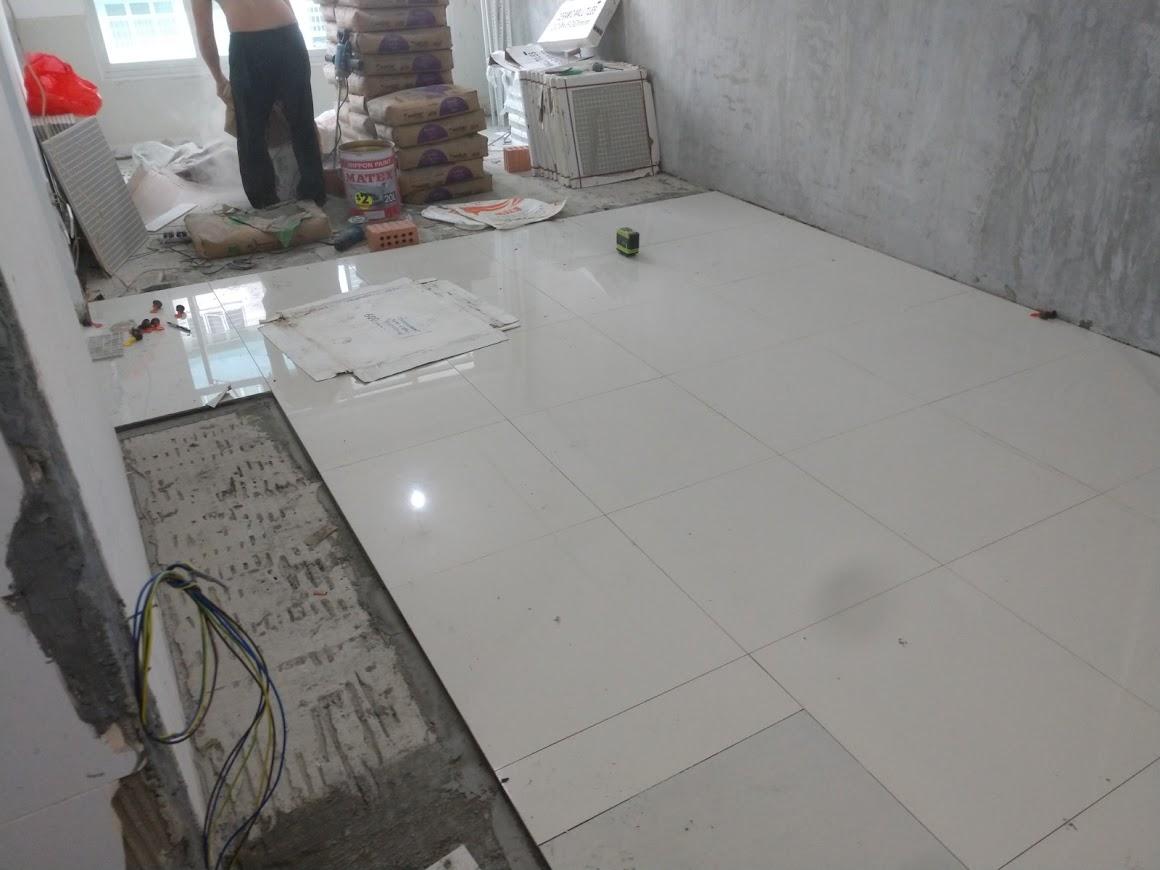 Asian Kitchen with Vinyl Flooring and Homogeneous Tiles