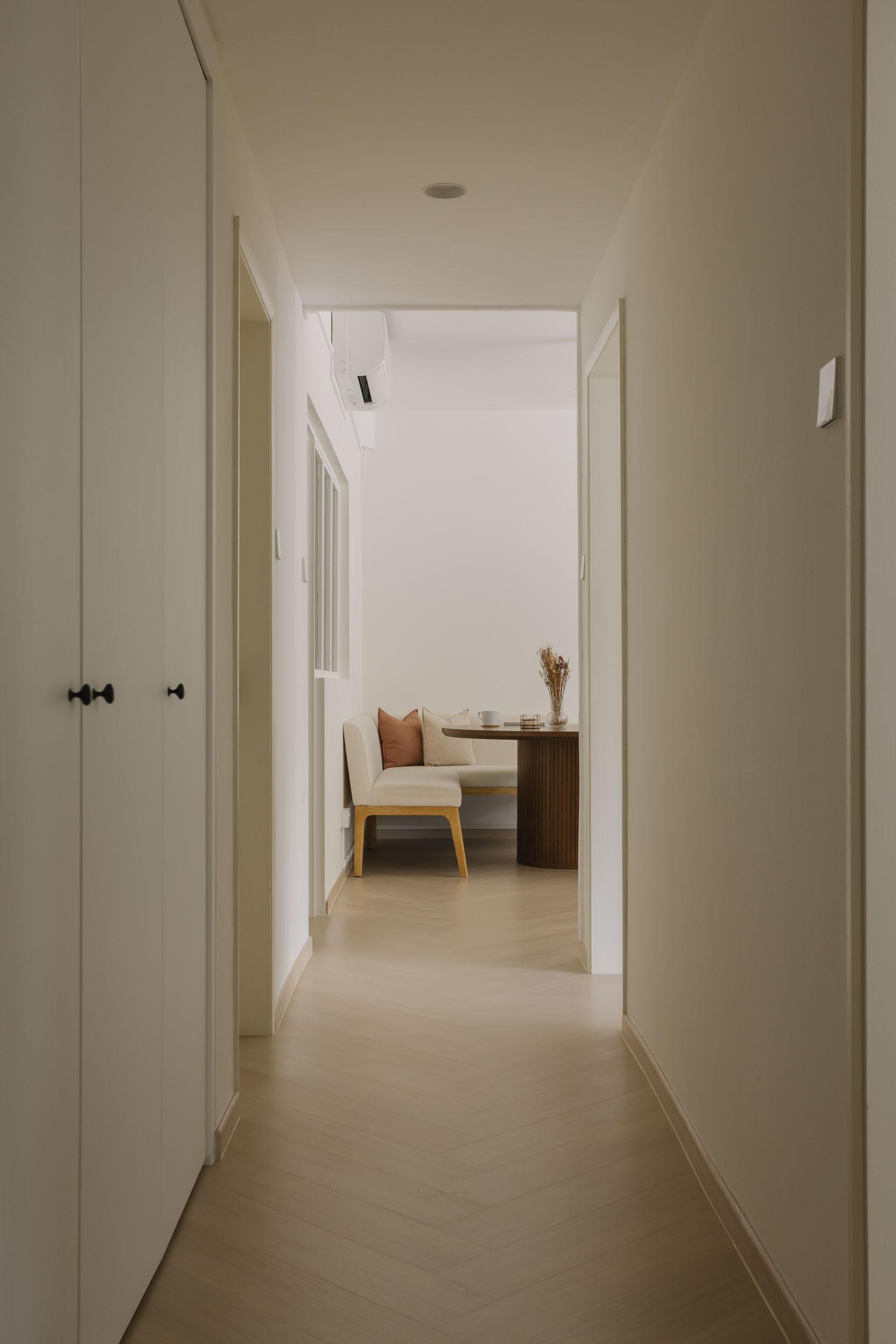 Country Hallway with Herringbone Tiling and Wood Flooring