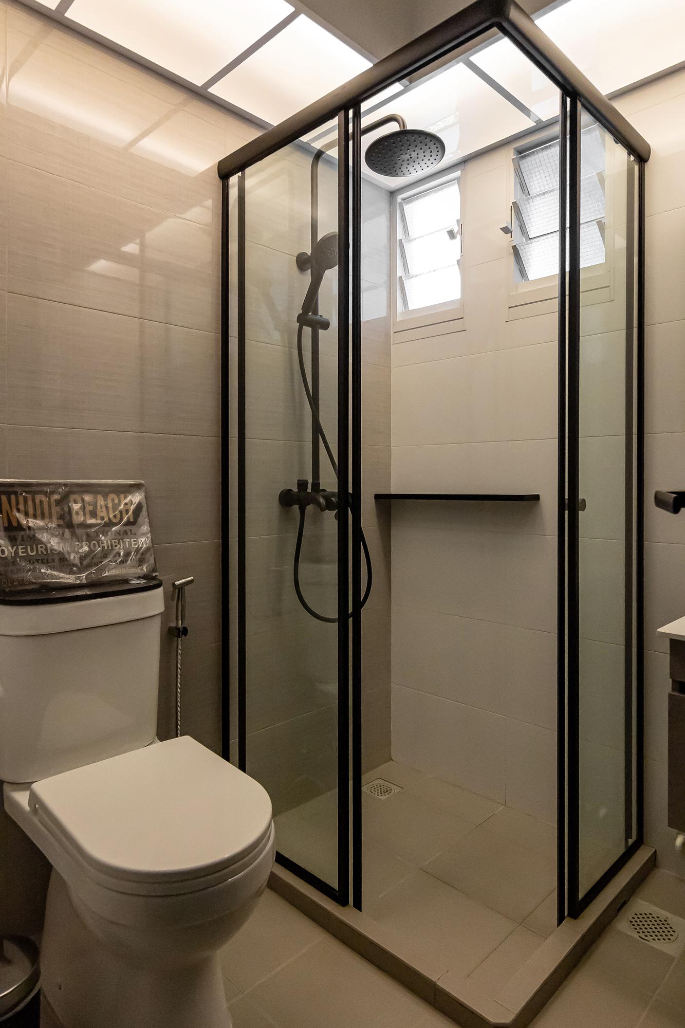 Industrial Bathroom with Homogeneous Tiles and Artwork