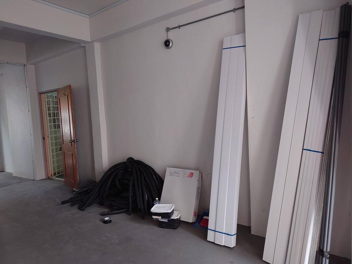 Asian Home Office with Bookshelf and Wallpaper