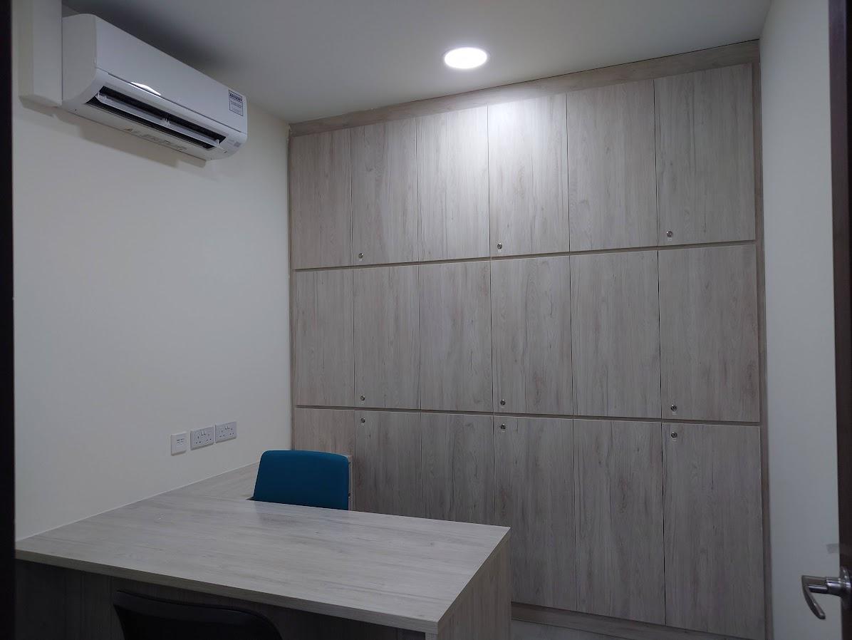 Asian Home Office with Wallpaper and Desk Chairs