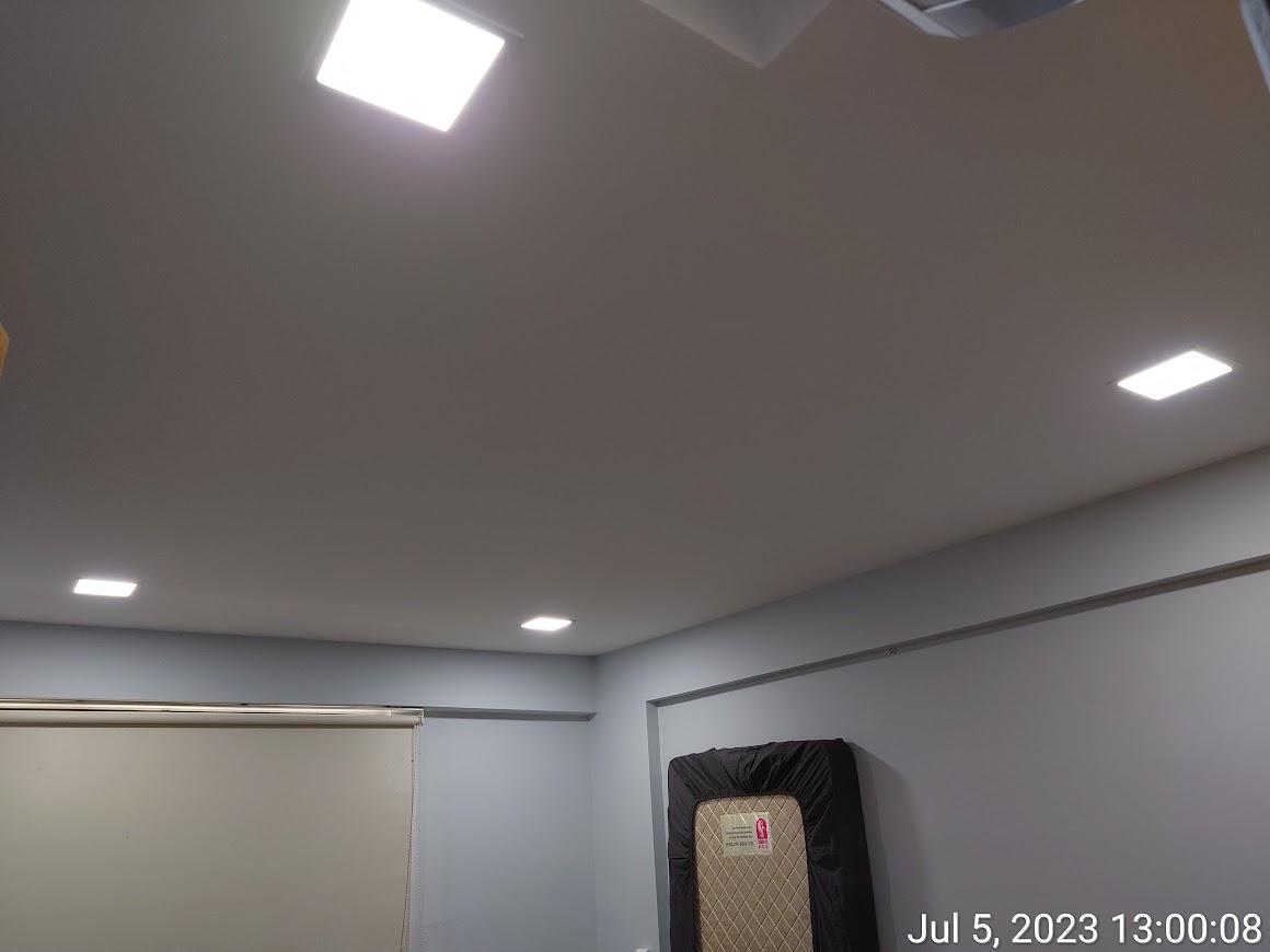 Asian Bedroom with Cove Lighting and Drop Ceiling
