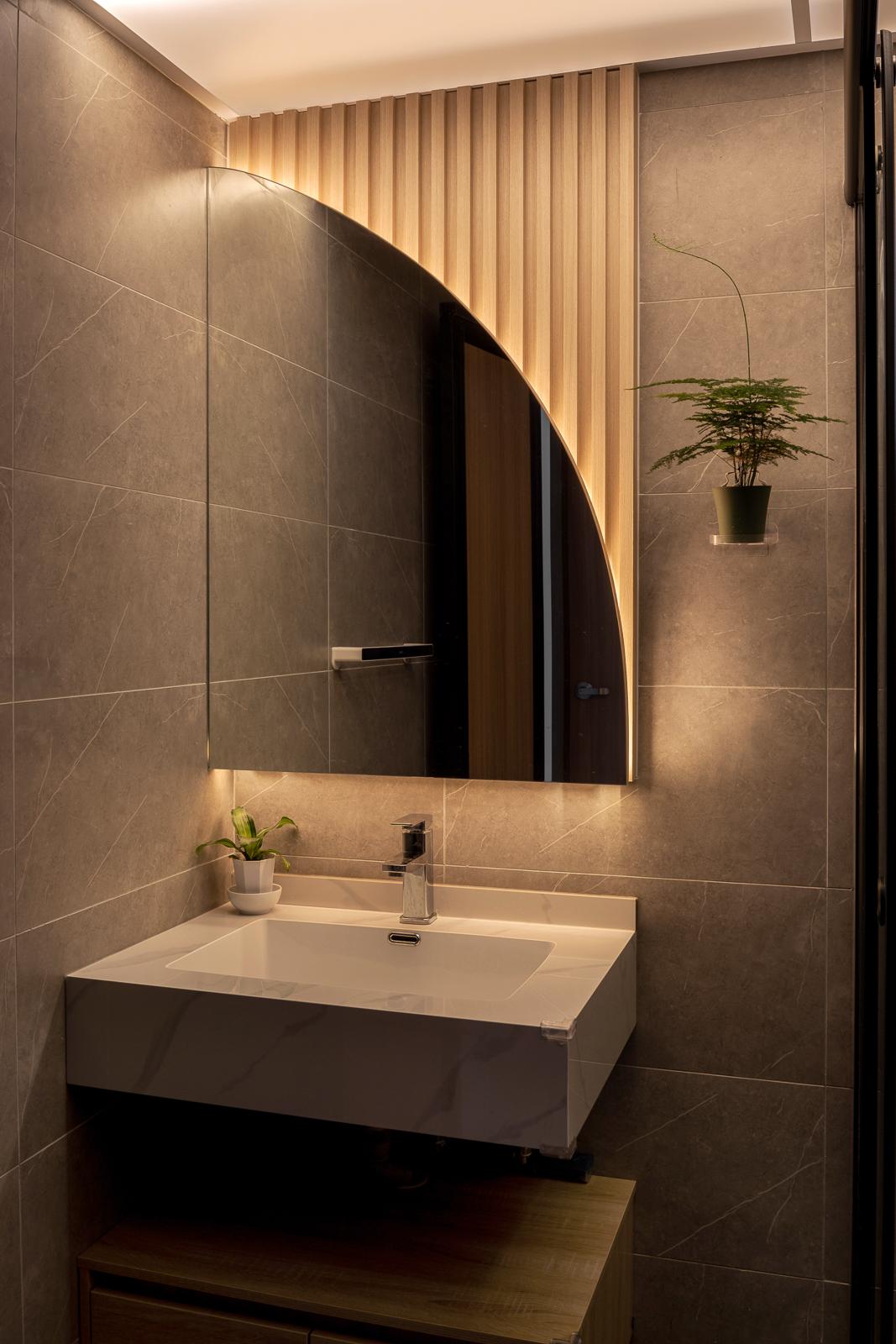 Modern Bathroom with Homogeneous Tiles and Mirror