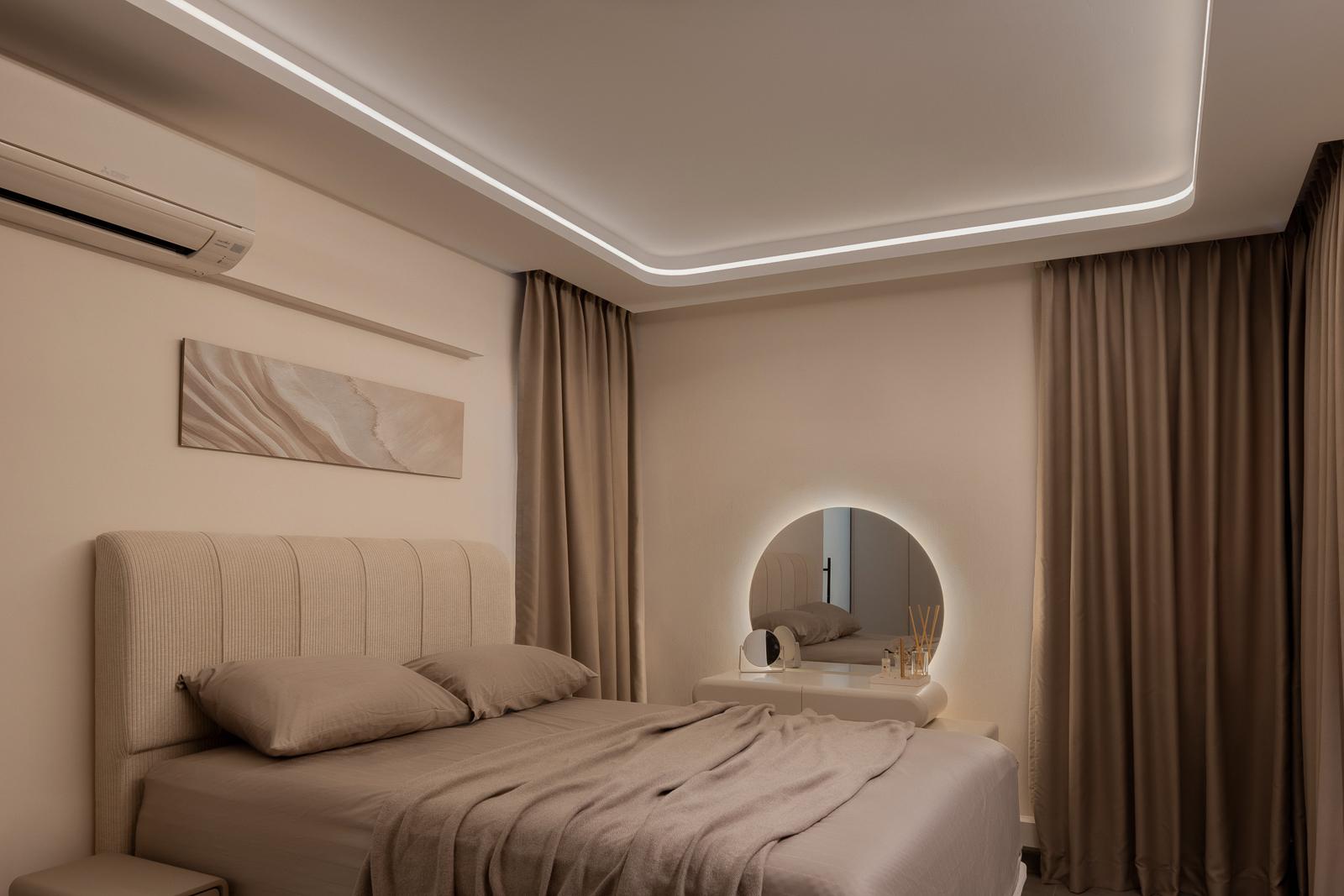 Modern Bedroom with Mirror and Artwork