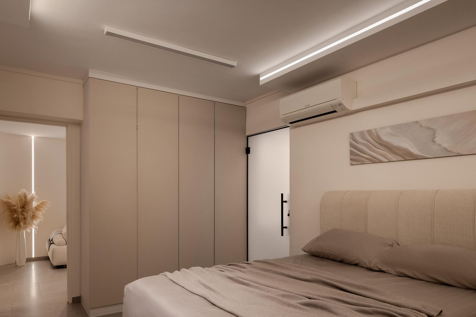 Modern Bedroom with Artwork and Glass Door
