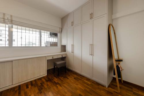 Transitional Walk-in Wardrobe at Serangoon Maisonette