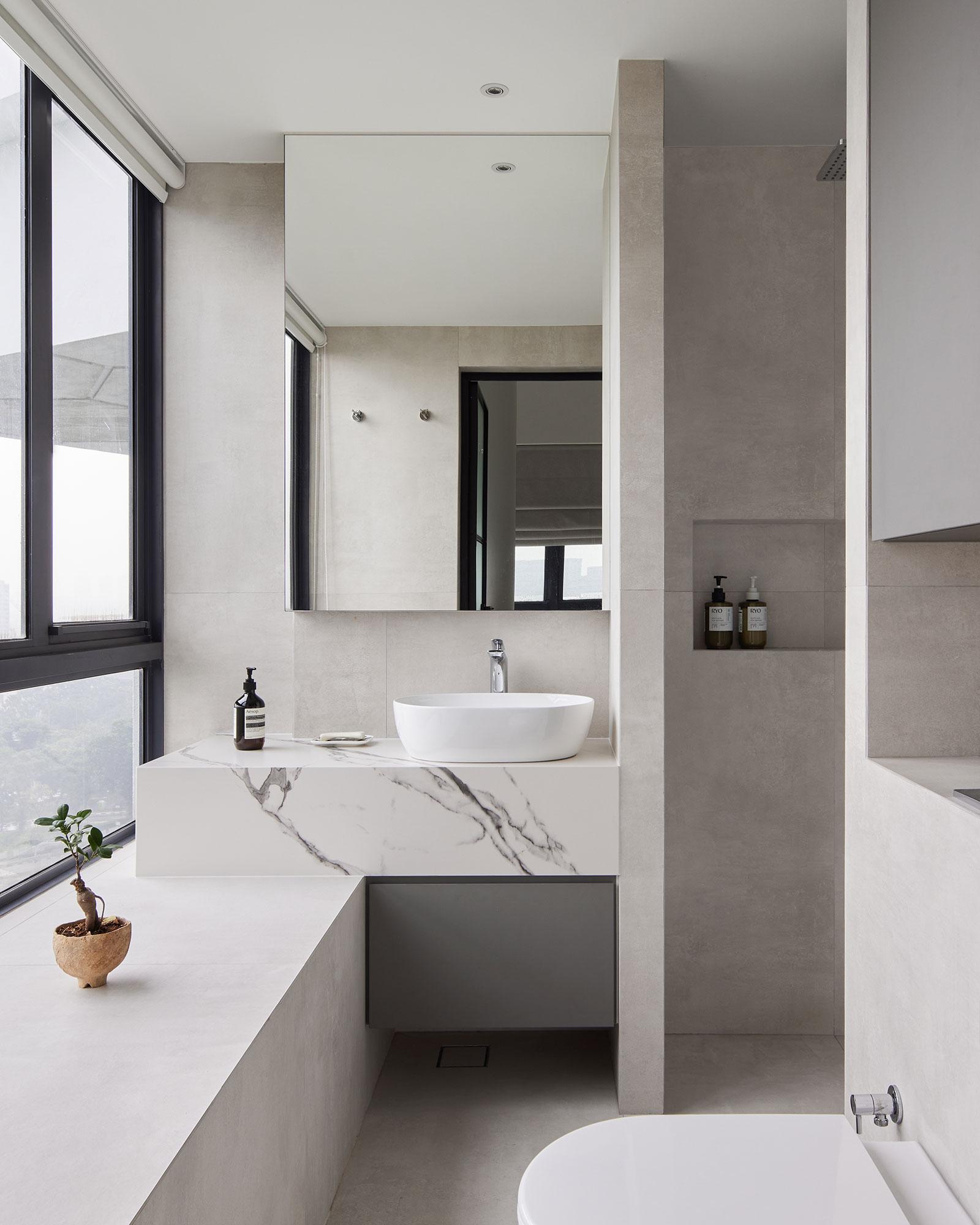 Minimalist Bathroom with Countertop and Homogeneous Tiles